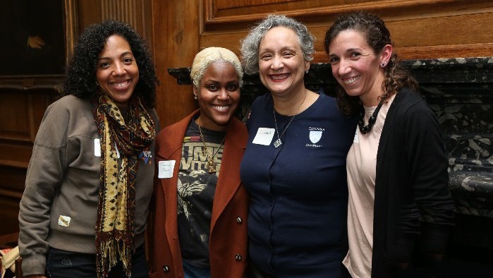 Four of the five incoming Bundles Scholars in 2022. From left to right: Patricia Marte, Tiffany Parkes, Glenna Meeks, and Abby Oulton. Photo by Bruce Gilbert. Diverse group of four women wearing name tags
